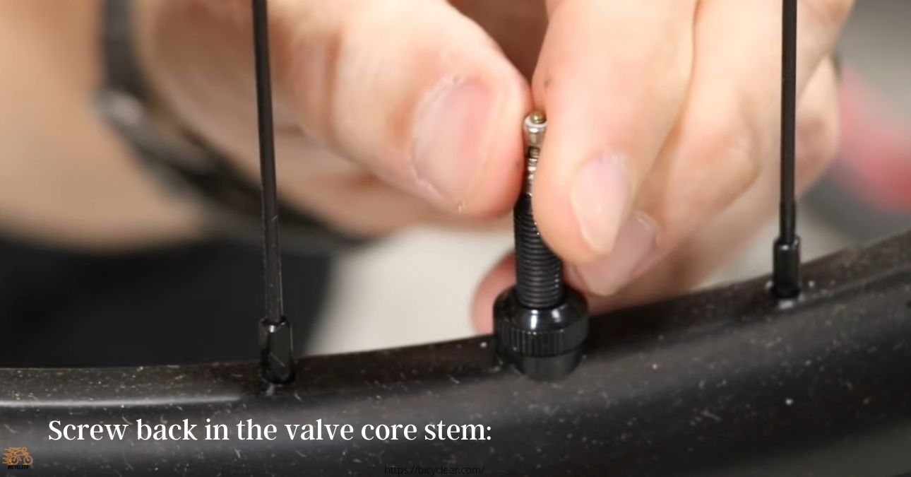 Step 3  Screw back in the valve core stem